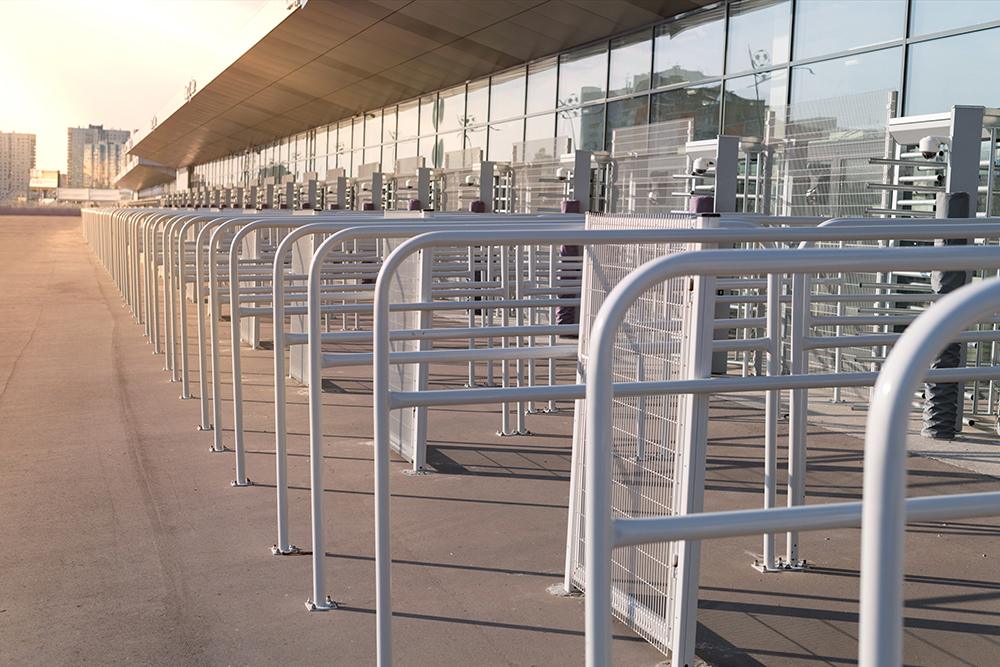 Security entrance gate - secured turnstiles before inspection at